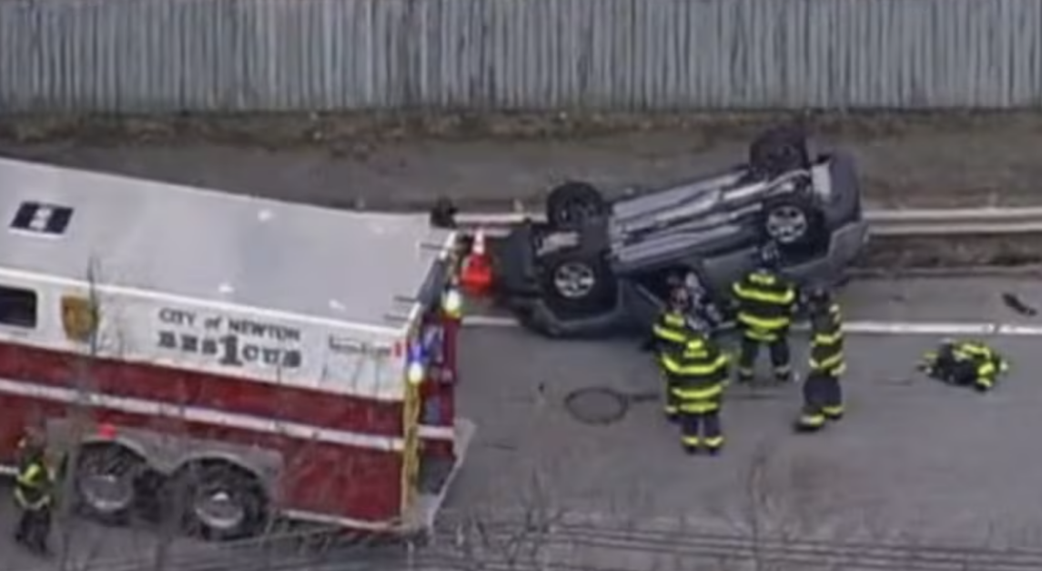 The driver of the flipped car was immediately transported to a local hospital. (Image Courtesy of Boston 25 News)